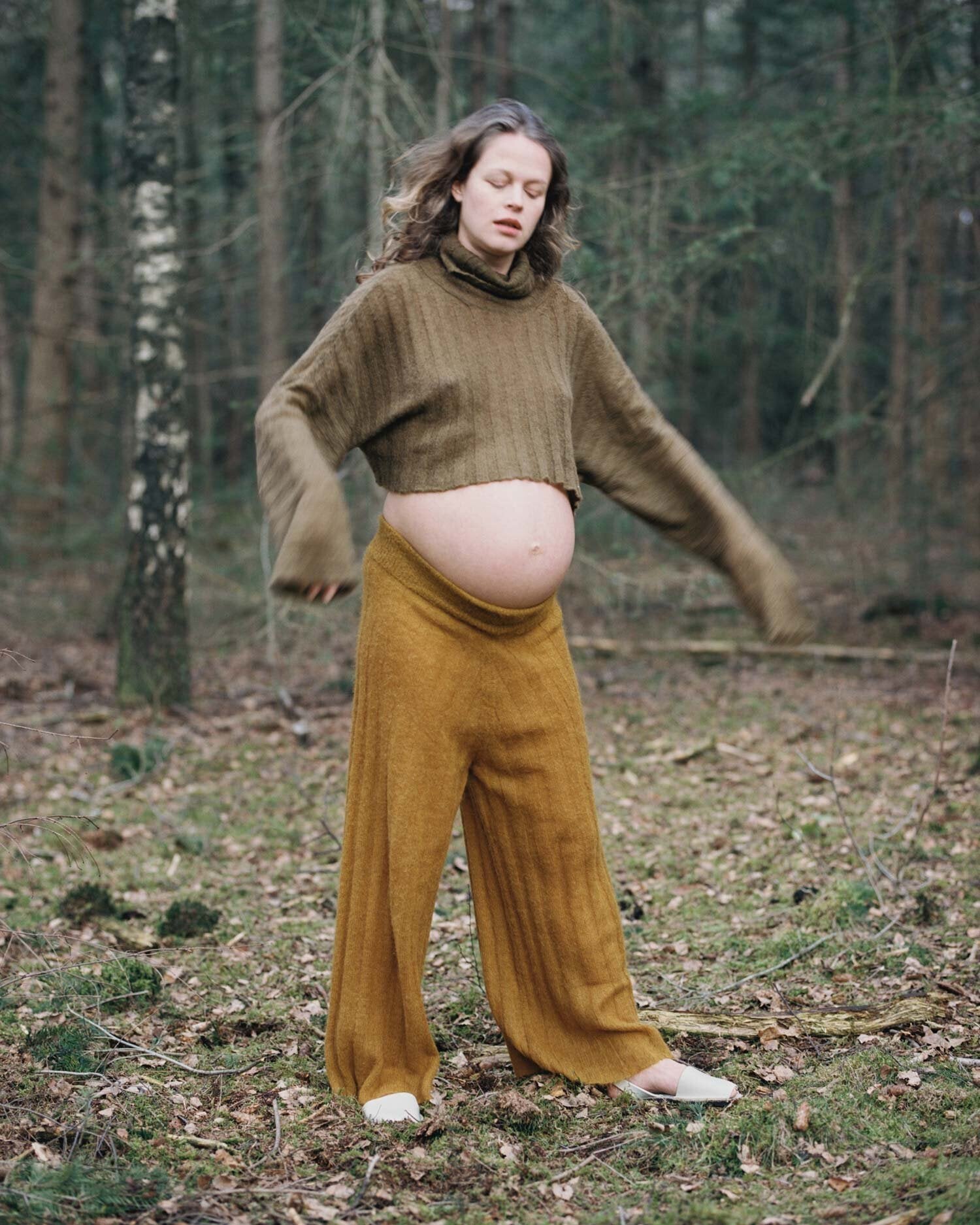 Imke wearing the SENSU sweater and SHOJI pants.