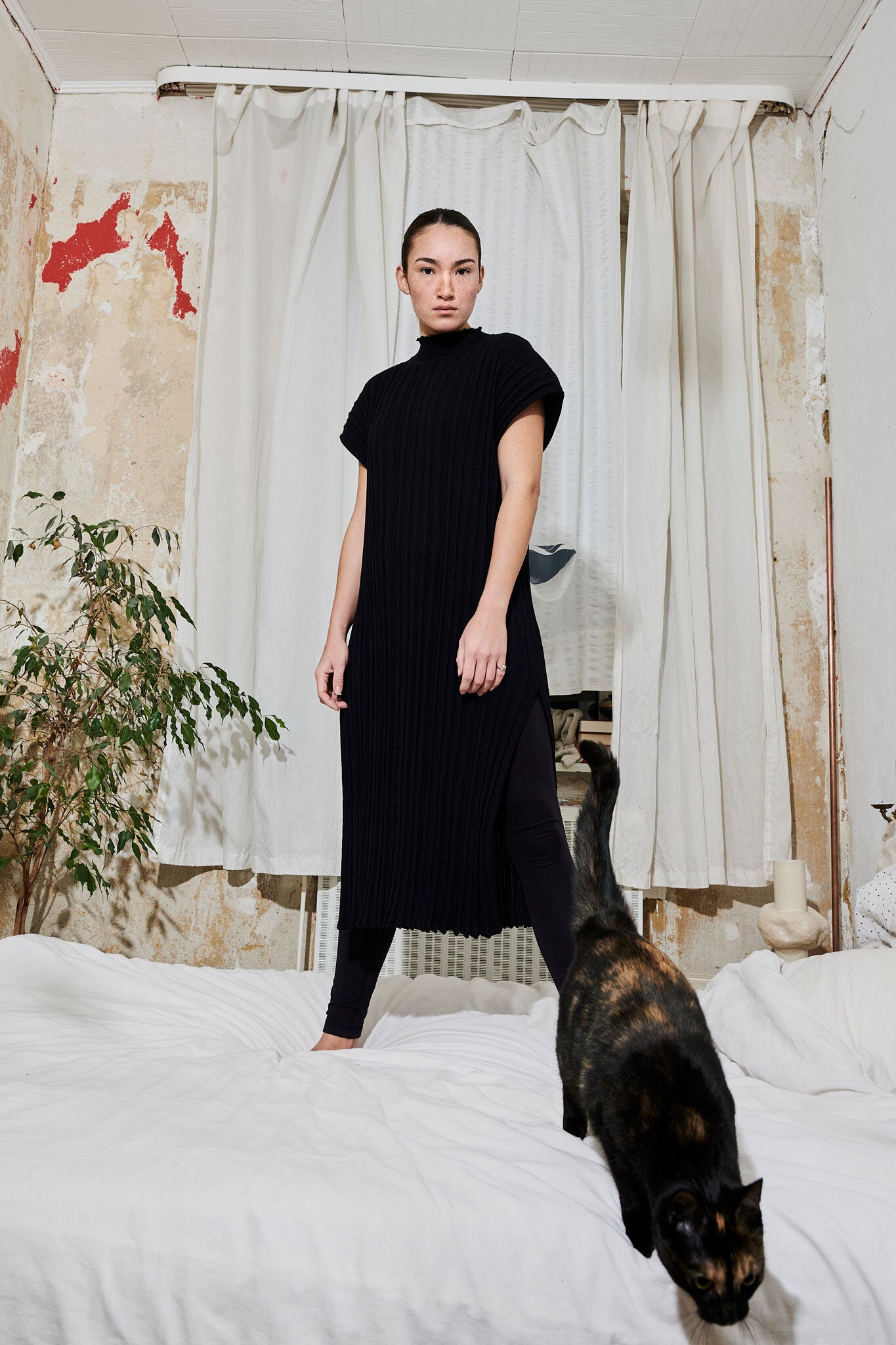 Jassica wearing the HIGASA pleated dress in Ink. Photographed by Nicolas Wefers.