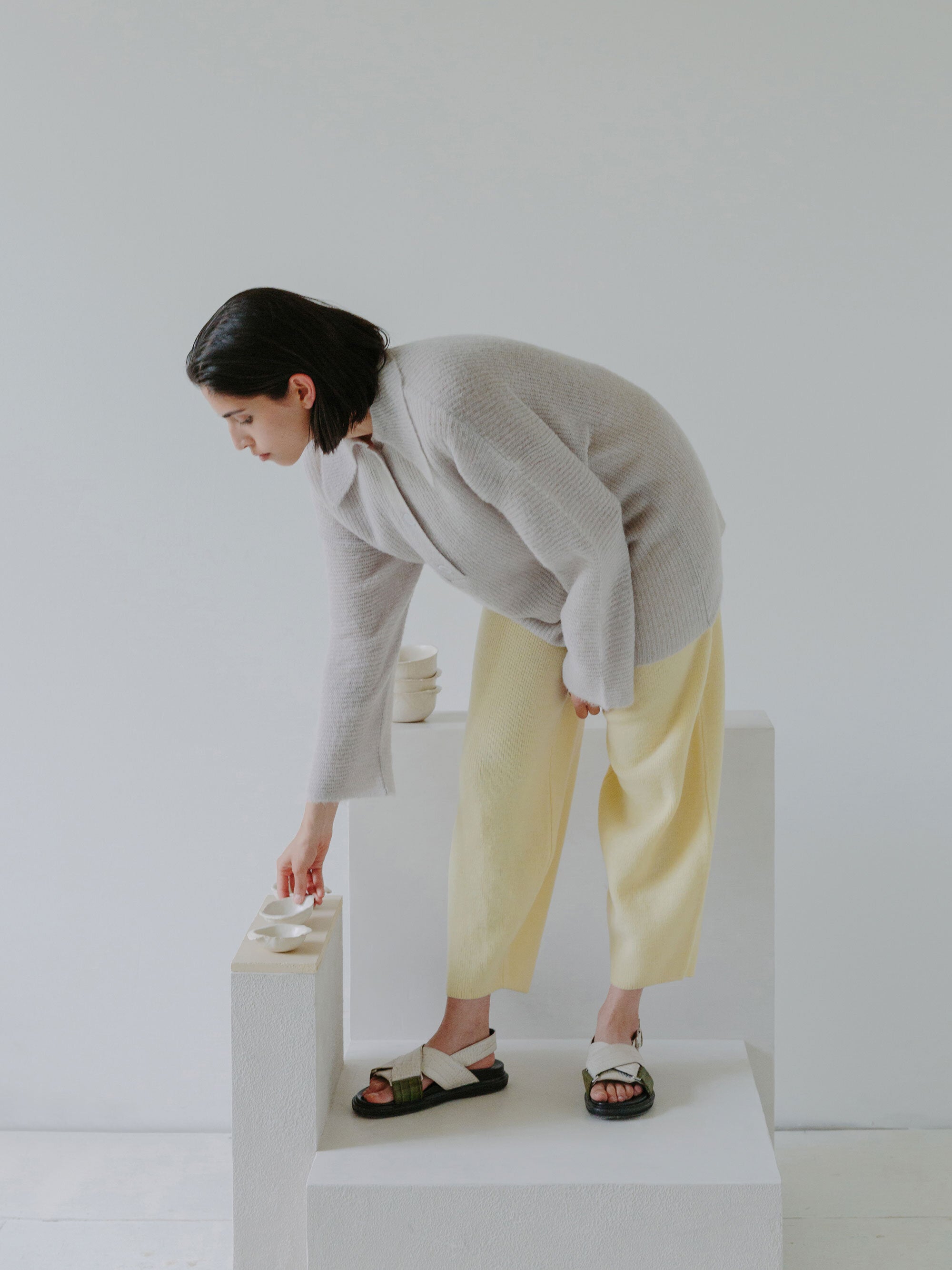 FUKU polo sweater in Ice and NAIFU pants in Butter.